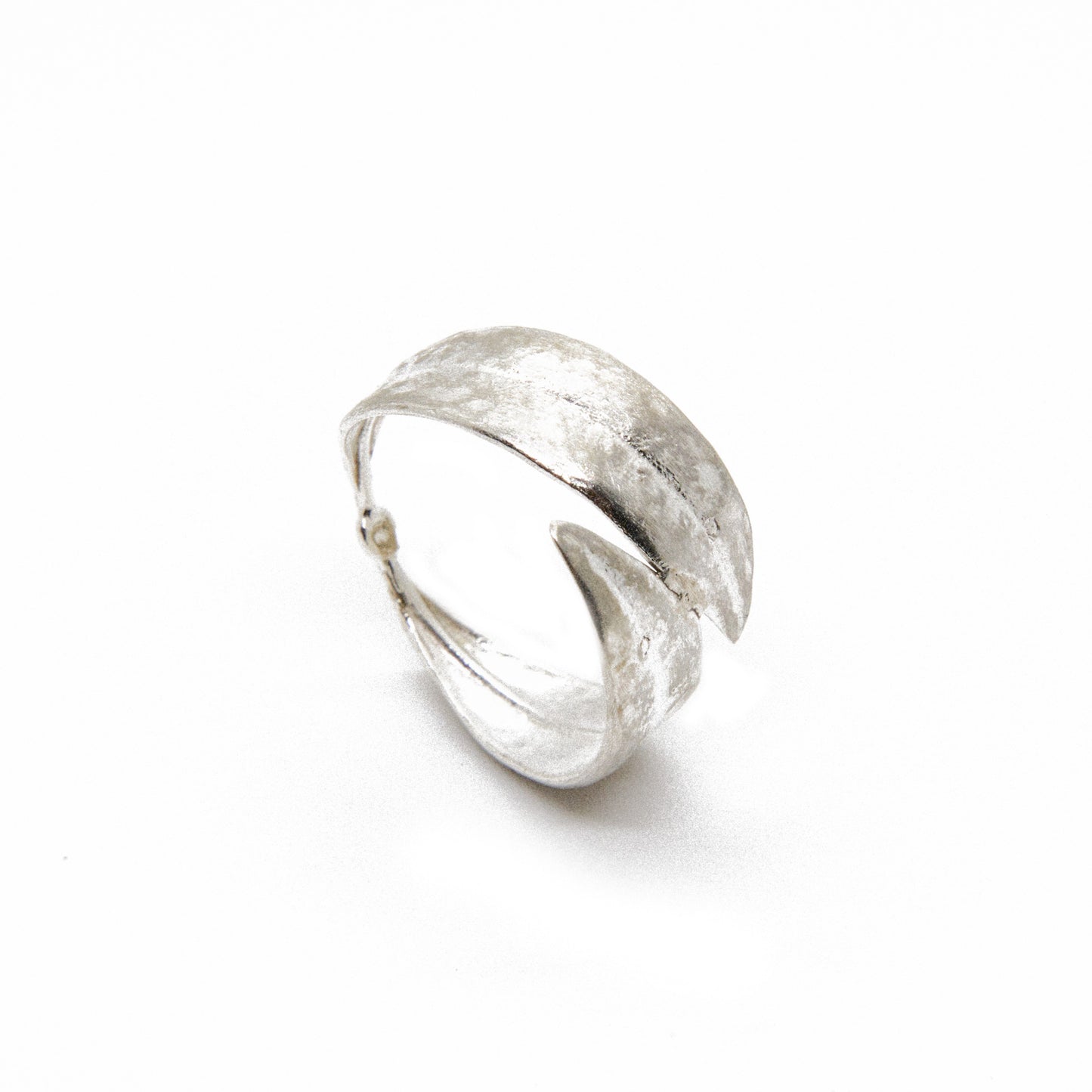 Handcrafted sterling silver ring adorned with unique and intricate olive leaves design, showcasing exquisite craftsmanship and individuality in a nature-inspired, one-of-a-kind jewelry piece